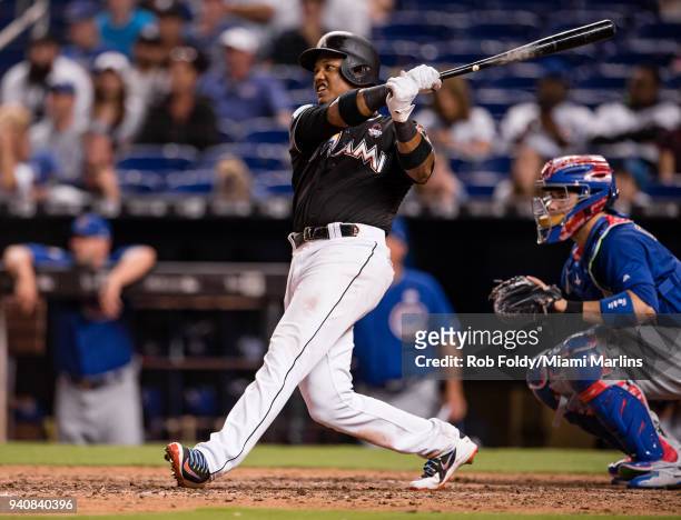 Starlin Castro of the Miami Marlins at bat during the game against the Chicago Cubs at Marlins Park on March 30, 2018 in Miami, Florida. Starlin...