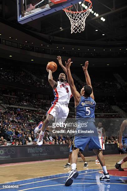 Rodney Stuckey of the Detroit Pistons goes up for a shot attempt against Dominic McGuire of the Washington Wizards in a game at the Palace of Auburn...