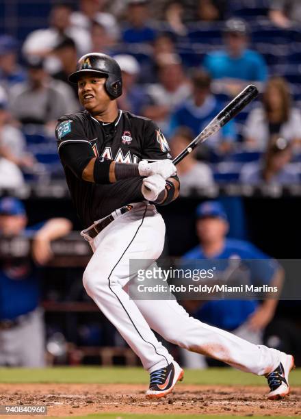 Starlin Castro of the Miami Marlins at bat during the game against the Chicago Cubs at Marlins Park on March 30, 2018 in Miami, Florida. Starlin...