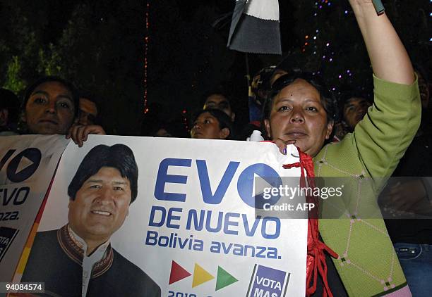 Supporters of Bolivian President Evo Morales celebrate his reelection in La Paz on Diciembre 6, 2009. Bolivia's leftist President Evo Morales won a...