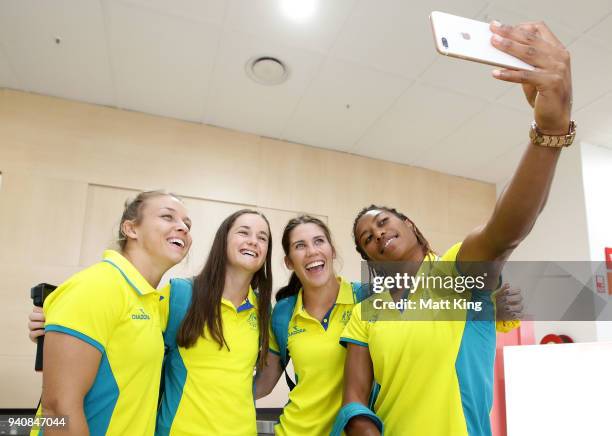 Georgina Friedrichs, Dominique Du Toit, Charlotte Caslick and Ellia Green of the Australia women's rugby sevens team arrive at Gold Coast airport...