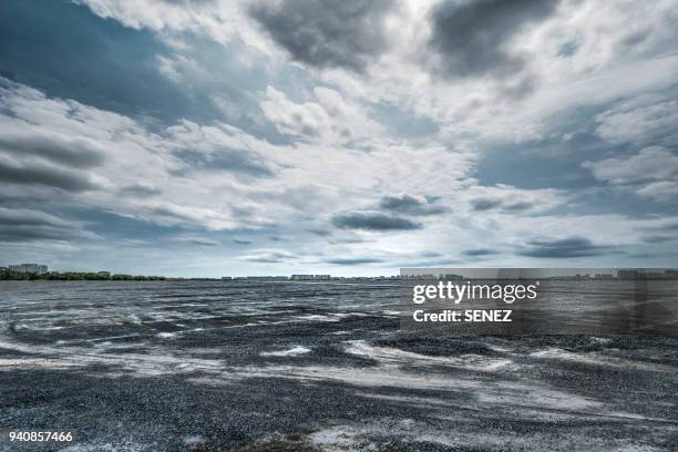 parking lot - ominous sky stock pictures, royalty-free photos & images