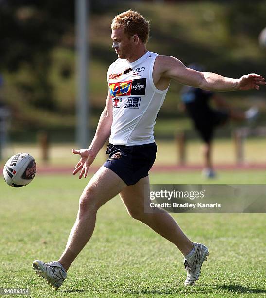 Peter Wallace kicks the ball during a Brisbane Broncos NRL training session at the University of Queensland on December 7, 2009 in Brisbane,...