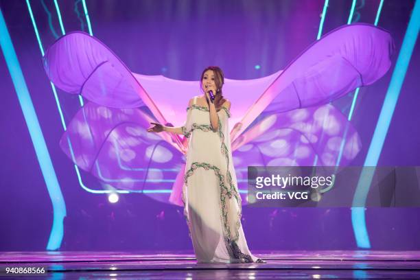 Singer Joey Yung performs during a launch ceremony of OPPO R15 on March 31, 2018 in Shenzhen, Guangdong Province of China.