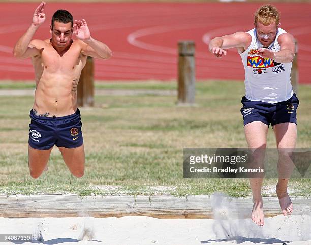 Denan Kemp and Peter Wallace run a drill during a Brisbane Broncos NRL training session at the University of Queensland on December 7, 2009 in...