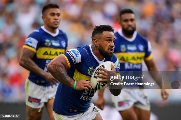 Kenneth Edwards of the Eels runs the ball during the round four NRL match between the Wests Tigers and the Parramatta Eels at ANZ Stadium on April 2,...