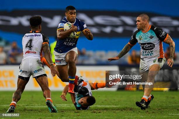 Michael Jennings of the Eels runs the ball during the round four NRL match between the Wests Tigers and the Parramatta Eels at ANZ Stadium on April...