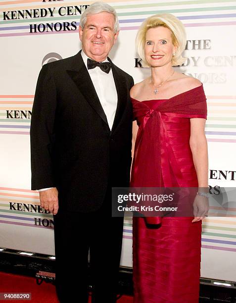 Former Republican Speaker of the House Newt Gingrich and Callista Gingrich pose for photographers on the red carpet before the 32nd Kennedy Center...