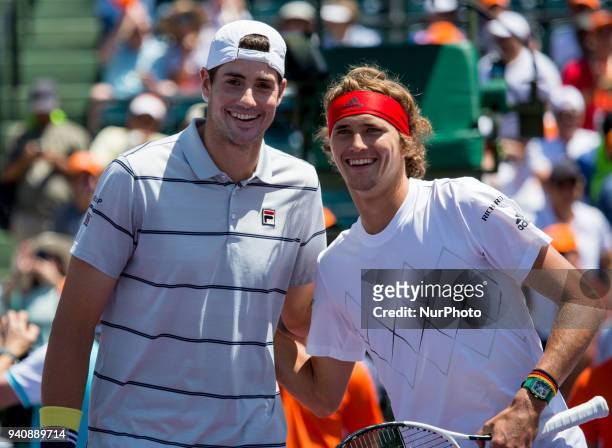 John Isner, from the USA and Alexander Zverev, from Germany, poses for the cameras before the Miami Open final in Key Biscayne in Key Biscayne, on...