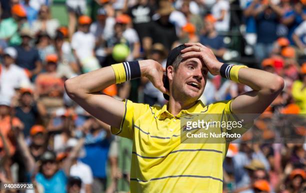 John Isner, from the USA, celebrates his title at the Miami Open, his first ATP Master 1000. Isner defeated Zverez 6-7, 6-4, 6-4 in Key Biscayne, on...