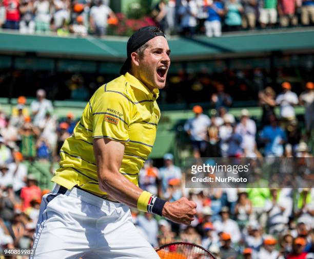 John Isner, from the USA, celebrates his title at the Miami Open, his first ATP Master 1000. Isner defeated Zverez 6-7, 6-4, 6-4 in Key Biscayne, on...