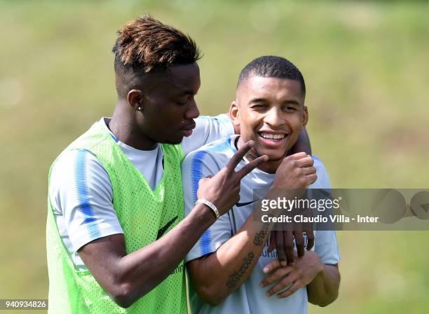 Yann Karamoh and Dalbert Henrique Chagas Estevão of FC Internazionale in action during the FC Internazionale training session at the Angelo Moratti...