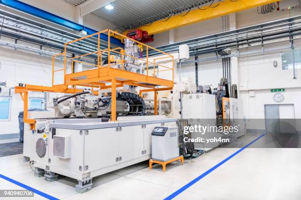 large injection plastic machinery - mould stock pictures, royalty-free photos & images