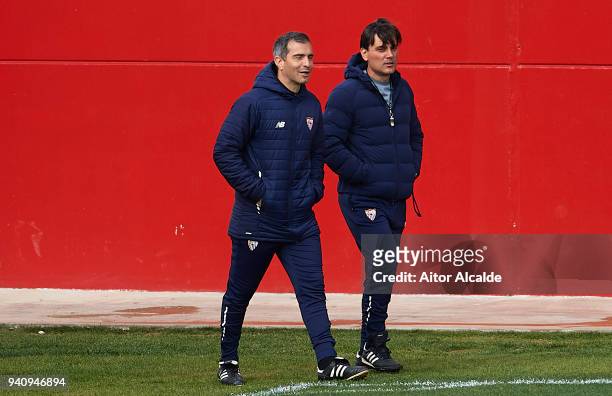 Second coach of Sevilla FC Enzo Maresca abd Head Coach of Sevilla FC Vincenzo Montella looks on during the training session prior to their UEFA...