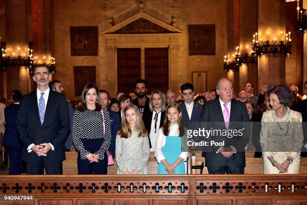 King Felipe, Queen Letizia, Princess Leonor, Princess Sofia of Spain, King Juan Carlos and Queen Sofia attend the Easter mass on April 1, 2018 in...