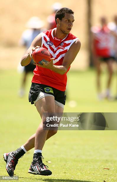 Michael Johnson of the Dockers runs with the ball during a Fremantle Dockers AFL training session at Santich Park on December 7, 2009 in Fremantle,...