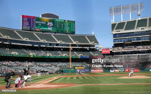 Shohei Ohtani of the Los Angeles Angels throws his first pitch during the first inning of a game against the Oakland Athletics on April 1 in Oakland,...