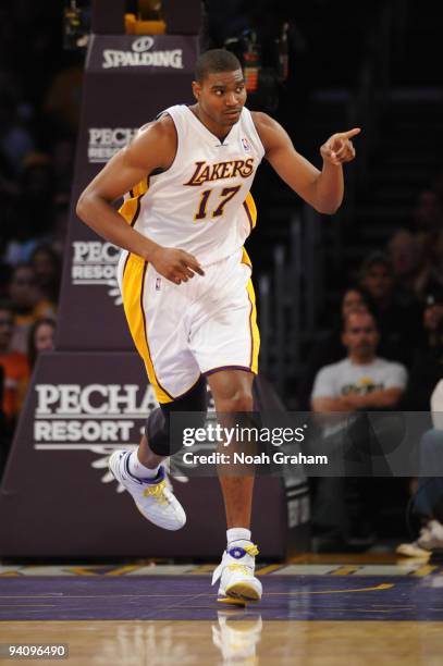 Andrew Bynum of the Los Angeles Lakers gestures during a game against the Phoenix Suns at Staples Center on December 6, 2009 in Los Angeles,...