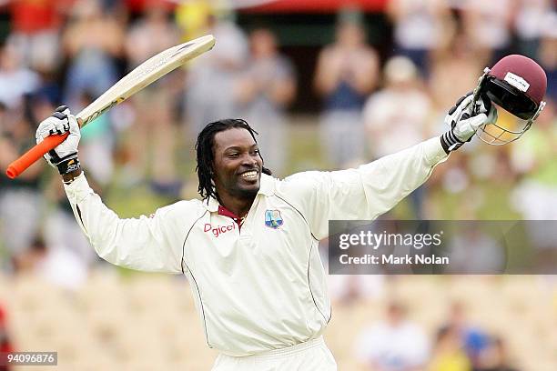 Chris Gayle of the West Indies celebrates reaching his century during day four of the Second Test Match between Australia and the West Indies at...