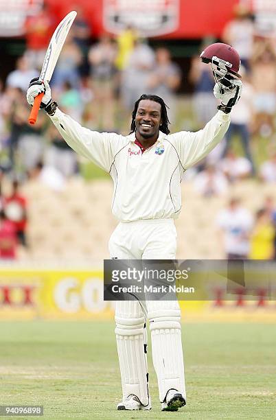 Chris Gayle of the West Indies celebrates reaching his century during day four of the Second Test Match between Australia and the West Indies at...