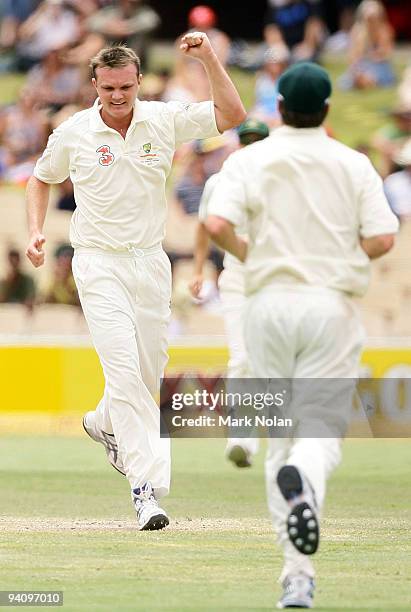 Doug Bollinger of Australia celebrates dismissing Shivnarine Chanderpaul of the West Indies during day four of the Second Test Match between...