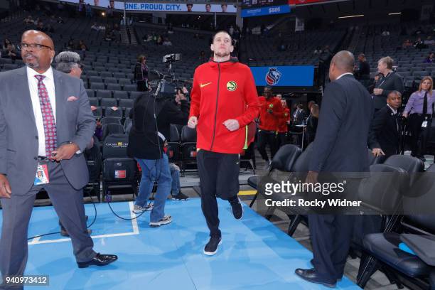 Mike Muscala of the Atlanta Hawks runs onto the court prior or the game against the Sacramento Kings on March 22, 2018 at Golden 1 Center in...