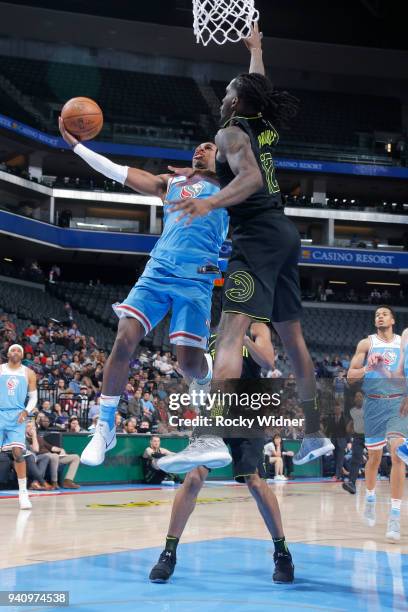 Buddy Hield of the Sacramento Kings shoots a layup against Taurean Prince of the Atlanta Hawks on March 22, 2018 at Golden 1 Center in Sacramento,...