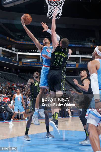 Skal Labissiere of the Sacramento Kings goes up for the shot against Mike Muscala of the Atlanta Hawks on March 22, 2018 at Golden 1 Center in...