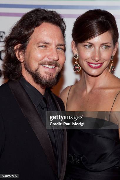 Musician Eddie Vedder and model Jill McCormick arrive at the 32nd Kennedy Center Honors at Kennedy Center Hall of States on December 6, 2009 in...