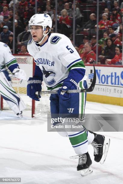 Derrick Pouliot of the Vancouver Canucks skates in the first period against the Chicago Blackhawks at the United Center on March 22, 2018 in Chicago,...