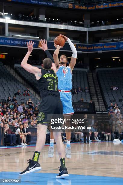 Skal Labissiere of the Sacramento Kings shoots against Mike Muscala of the Atlanta Hawks on March 22, 2018 at Golden 1 Center in Sacramento,...