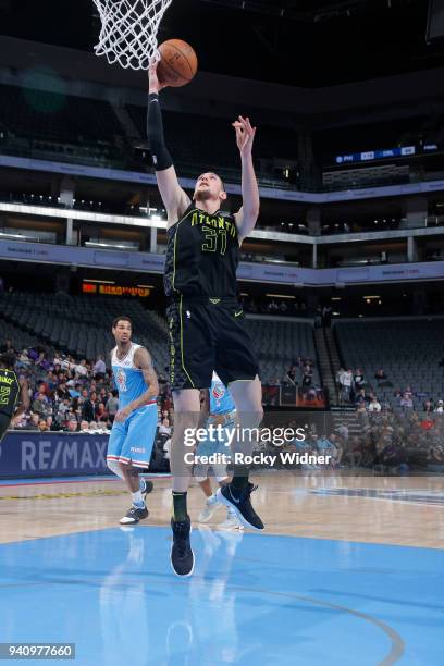 Mike Muscala of the Atlanta Hawks shoots a layup against the Sacramento Kings on March 22, 2018 at Golden 1 Center in Sacramento, California. NOTE TO...