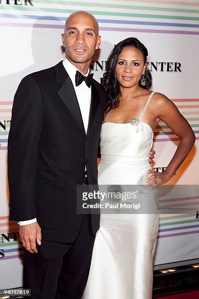 Mayor Adrian Fenty and Michelle Fenty arrive at the 32nd Kennedy Center Honors at Kennedy Center Hall of States on December 6, 2009 in Washington, DC.