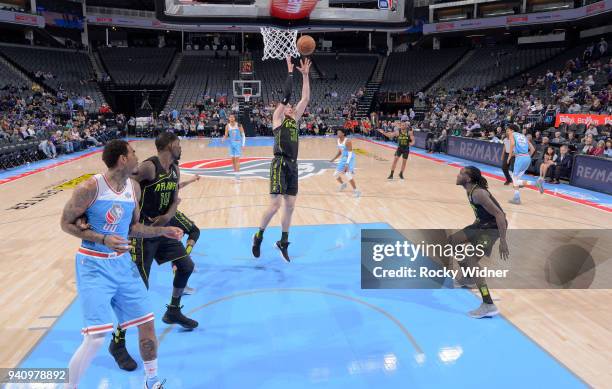 Mike Muscala of the Atlanta Hawks rebounds against the Sacramento Kings on March 22, 2018 at Golden 1 Center in Sacramento, California. NOTE TO USER:...