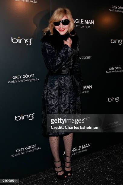 Recording artist Madonna attends a screening of "A Single Man" hosted by the Cinema Society and Tom Ford at The Museum of Modern Art on December 6,...