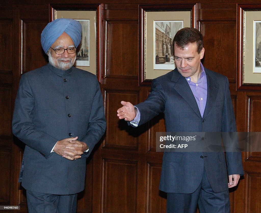 Russian President Dmitry Medvedev (R) me