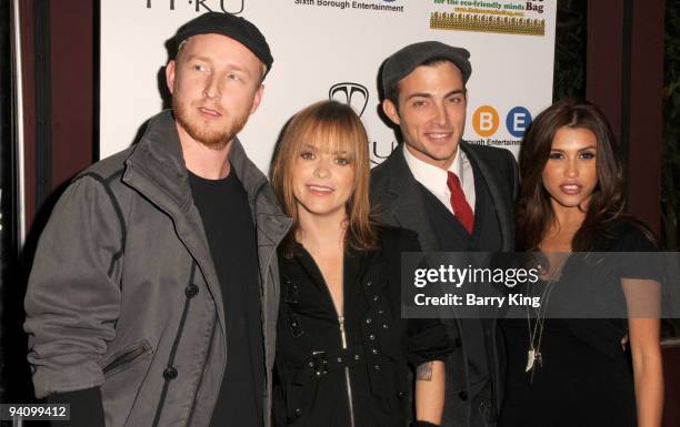 Michael Lenny, actress Taryn Manning, actor Brandon Trentham and actress Rachel Sterling attend an AIDS Marathon Charity event held at Janes House on...