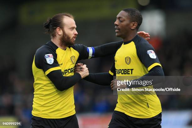 Marvin Sordell of Burton celebrates with teammate John Brayford of Burton after scoring their 1st goal during the Sky Bet Championship match between...