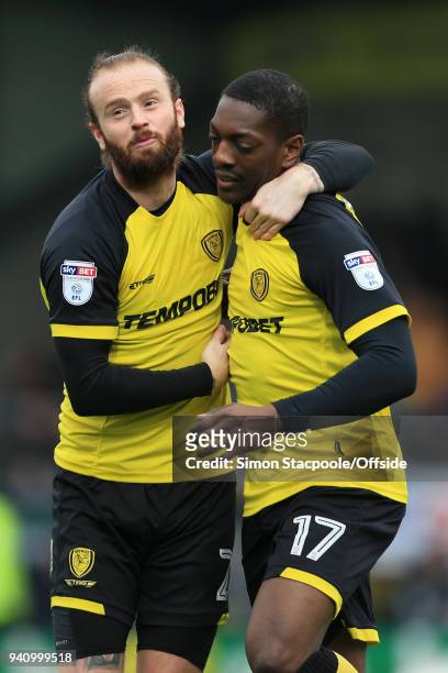 Marvin Sordell of Burton celebrates with teammate John Brayford of Burton during the Sky Bet Championship match between Burton Albion and...