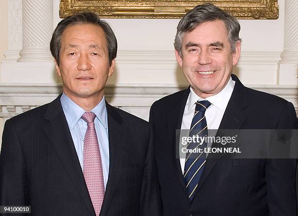 Vice-President of FIFA and Chairman of the ruling Grand National Party in South Korea Dr Mong-Joon Chung poses with British Prime Minister Gordon...