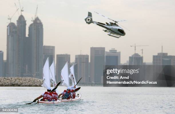 Team Qasr Al Sarab of New Zealand is pictured in front of the Skyline of Abu Dhabi on stage three with the camera helicopter on December 5, 2009 in...