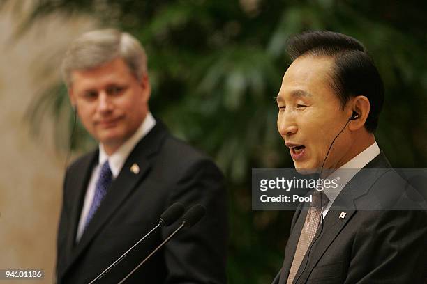 Canadian Prime Minister Stephen Harper and South Korean President Lee Myung-Bak attend a joint press conference at the presidential house on December...