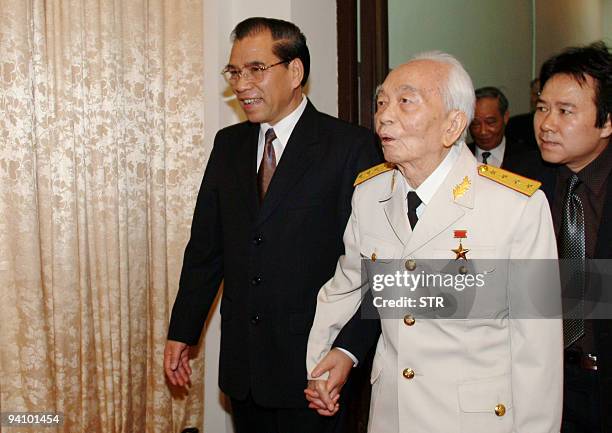 General Vo Nguyen Giap a master strategist of the Vietnamese communist Army over America, and General Secretary of Vietnamese Communist Party Nong...