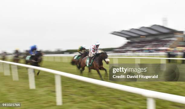 Meath , Ireland - 2 April 2018; Forge Meadow, with Robbie Power up, on their first time round during the Keelings Irish Strawberry Hurdle on Day 2 of...