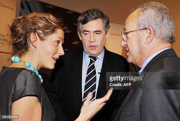 British Prime Minister Gordon Brown talks with web entrepreneur Martha Lane Fox and Lord Sainsbury, who have an advisory role to Government, in...