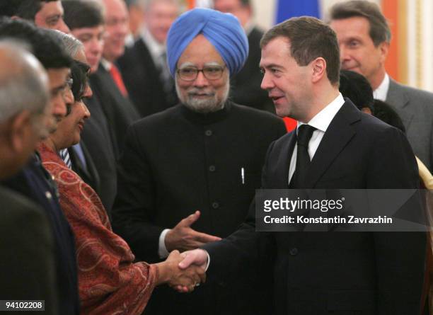 Russian President Dmitry Medvedev and Indian Prime Minister Manmohan Singh greet delegations during a Russian-Indian Summit in the Yekaterinninsky...