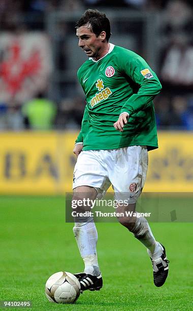 Zsolt Loew of Mainz runs with the ball during the Bundesliga match between Eintracht Frankfurt and FSV Mainz 05 at Commerzbank Arena on December 5,...