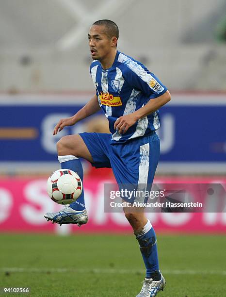 Shinji Ono of Bochum runs with the ball during the Bundesliga match between VfB Stuttgart and VfL Bochum at Mercedes-Benz Arena on December 5, 2009...