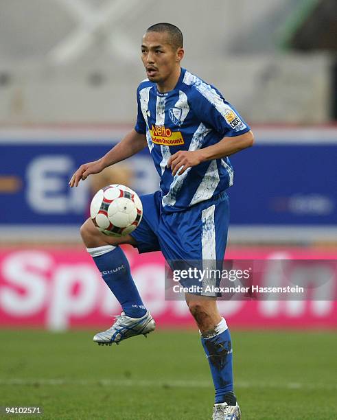 Shinji Ono of Bochum runs with the ball during the Bundesliga match between VfB Stuttgart and VfL Bochum at Mercedes-Benz Arena on December 5, 2009...