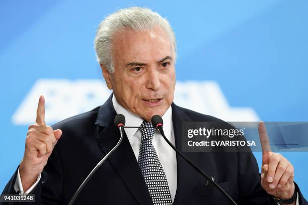 Brazilian President Michel Temer delivers a speech during the inauguration of the new Health and Transport ministers at the Planalto Palace in...